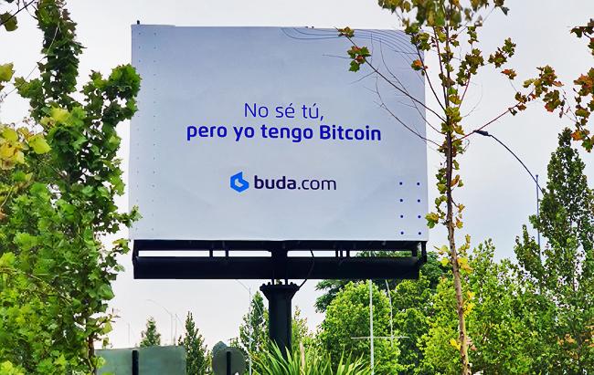 Buda letrero criptomonedas Publimark